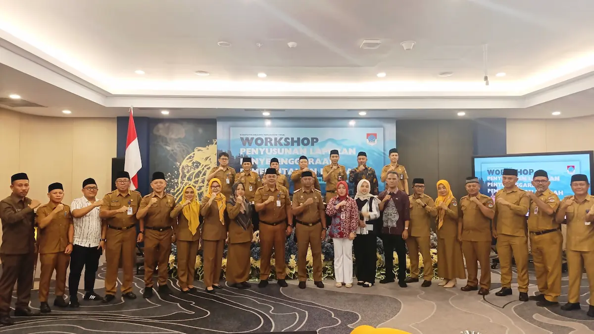 Bupati Boltim Oskar Manoppo bersama peserta Workshop Penyusunan LPPD 2025 di Kota Manado sulutviral.info