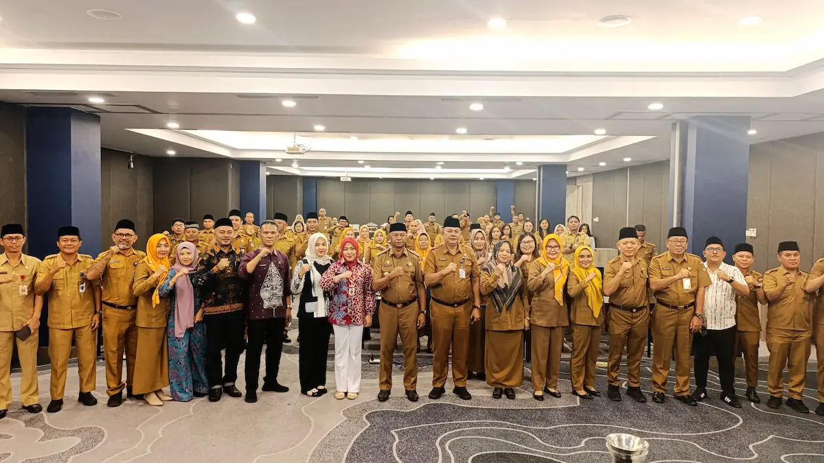 Bupati Boltim Oskar Manoppo foto bersama pimpinan OPD pada Workshop LPPD 2025 di Manado sulutviral.info