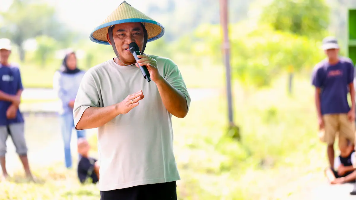 Gubernur Sulawesi Utara memberi sambutan pada Gerakan Tanam Padi di Bolmong sulutviral.info