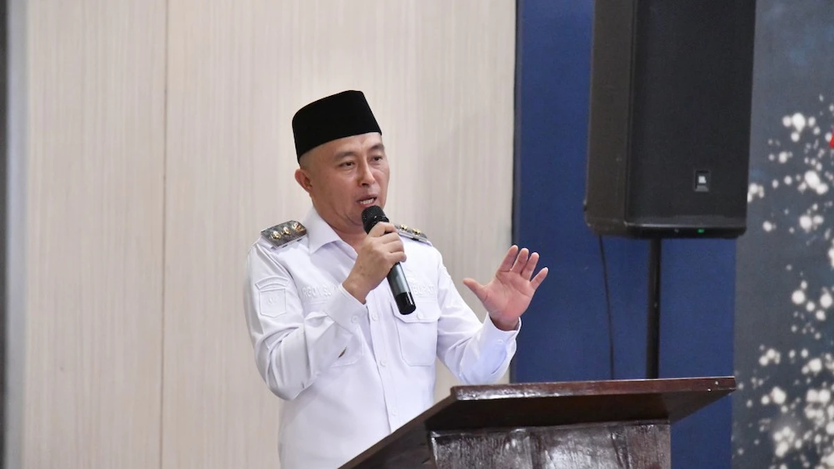 Wakil Bupati Bolaang Mongondow Timur Argo Sumaiku menutup Workshop Penyusunan LPPD Tahun Anggaran 2025 di Hotel The Sentra Manado sulutviral.info