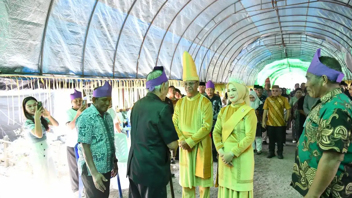 Bupati Oskar Manoppo menghadiri adat Tulude di Desa Jiko Bersatu Boltim sulutviral.info