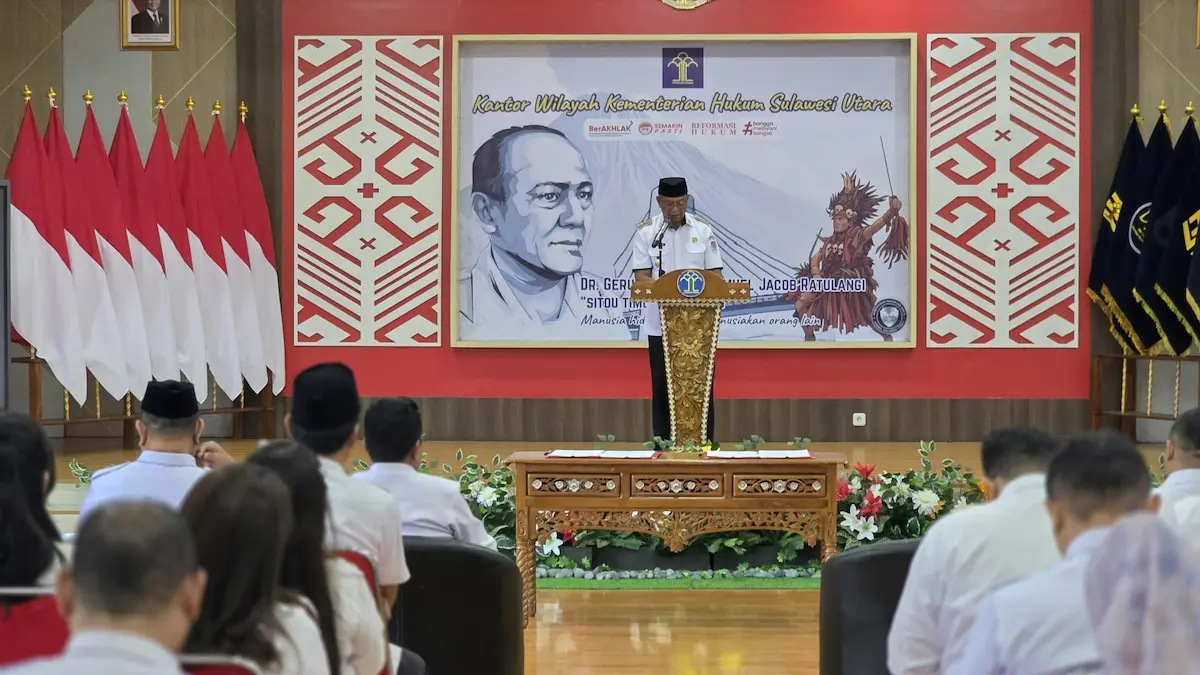 Bupati Bolaang Mongondow Timur Oskar Manoppo menyampaikan sambutan dalam penandatanganan kerja sama pelayanan hukum di Kanwil Kemenkum Sulut sulutviral.info