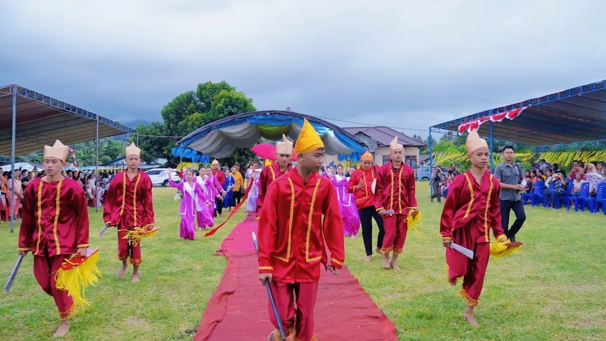 Penari adat sambut tamu Tulude Poigar 2026 Bolmong sulutviral.info
